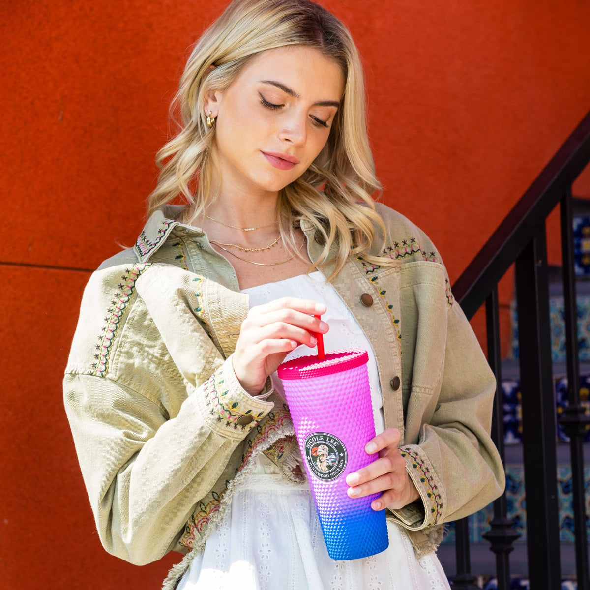 24 OZ STUDDED TUMBLER WITH STRAW LADY IN BLACK